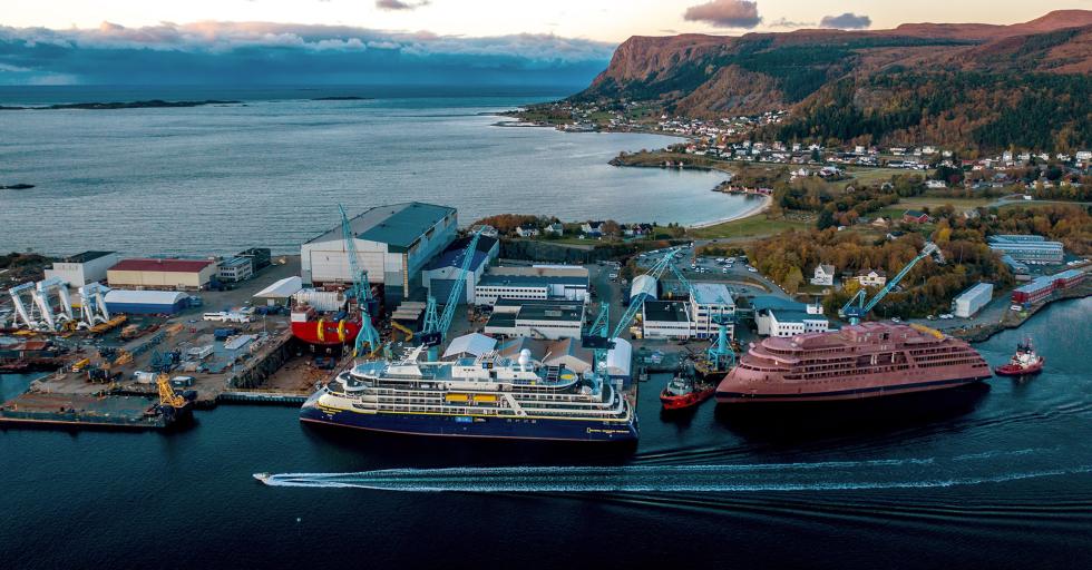 The 'Nexans Aurora', 'National Geographic Endurance' and 'National Geographic Resolution' in various stages of the newbuild process at Ulstein Verft. Photo: Ulstein Group/Oclin