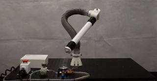 Malleable robotic arm that is guided into shape by a person using AR goggles