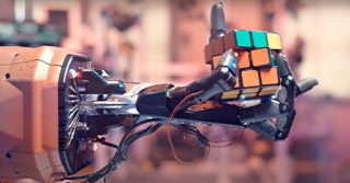 Solving Rubik’s Cube with a Robot Hand