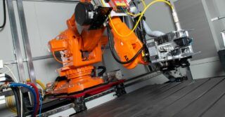 Laser structuring with an industrial robot: Functionalizing large areas faster and more cost-effectively